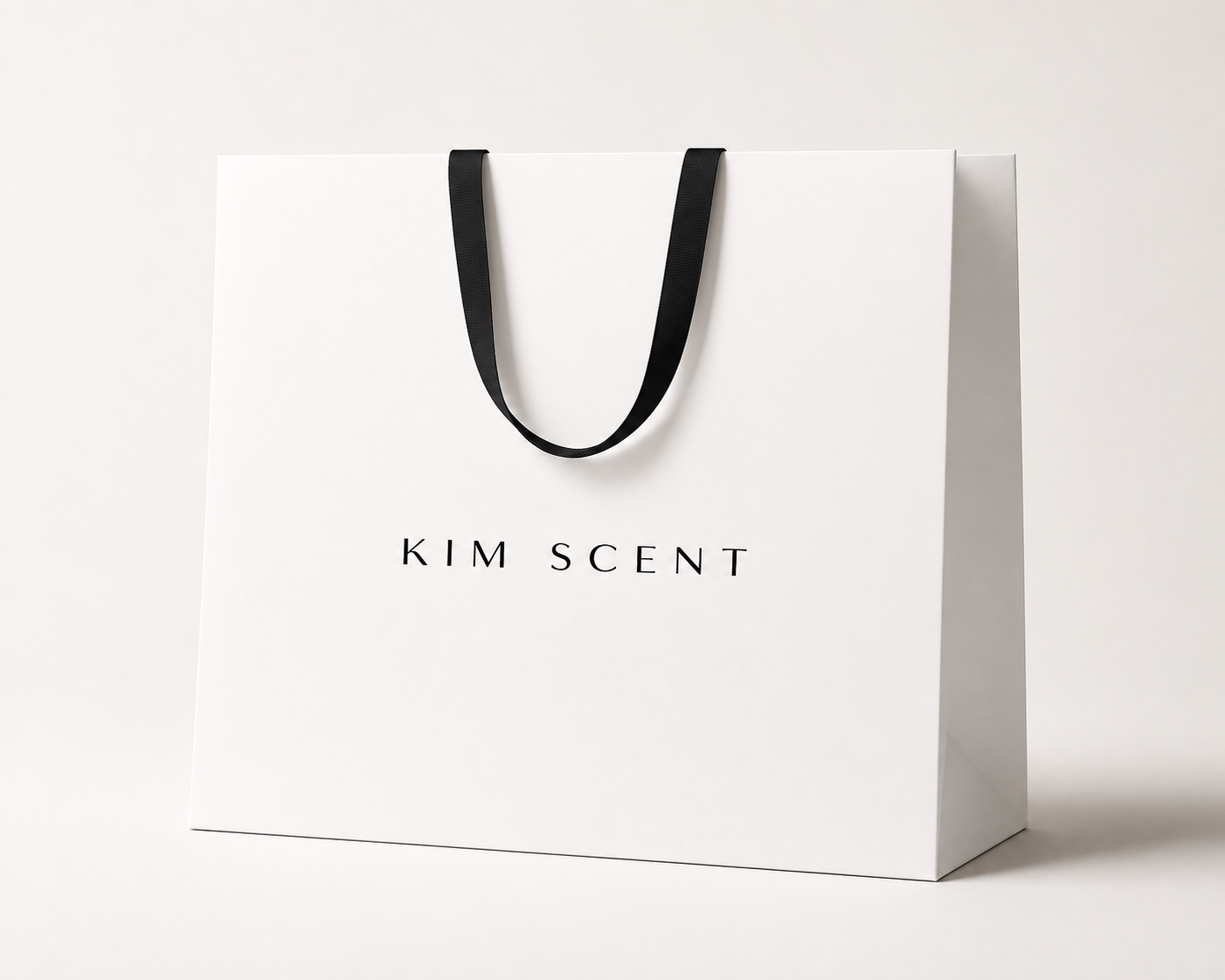 White KIM SCENT shopping bag with black ribbon handles